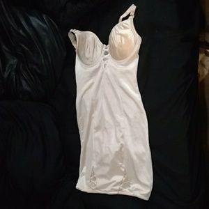 Shaping slip, with attached panty with snaps.